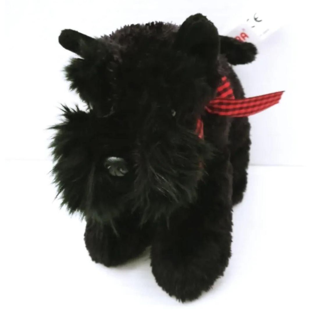 Front view of the Mini Flopsie Scottish Terrier plush toy highlighting its shaggy jet-black face, sweet dark eyes, and red plaid collar.
