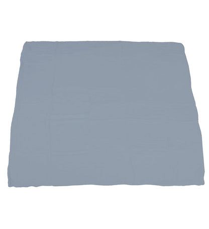 The reversible blanket fully unrolled to display the solid blue fog slate-colored side.