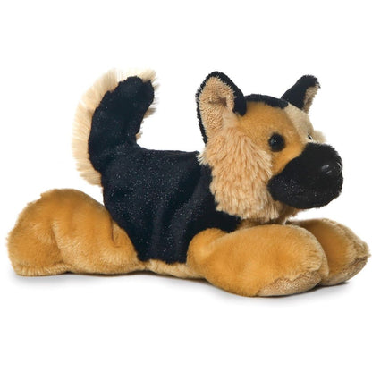 Angled front view of the 8-inch Aurora Mini Flopsie Shep German Shepherd stuffed animal lying down, showing its tan and black fur and perky tail.