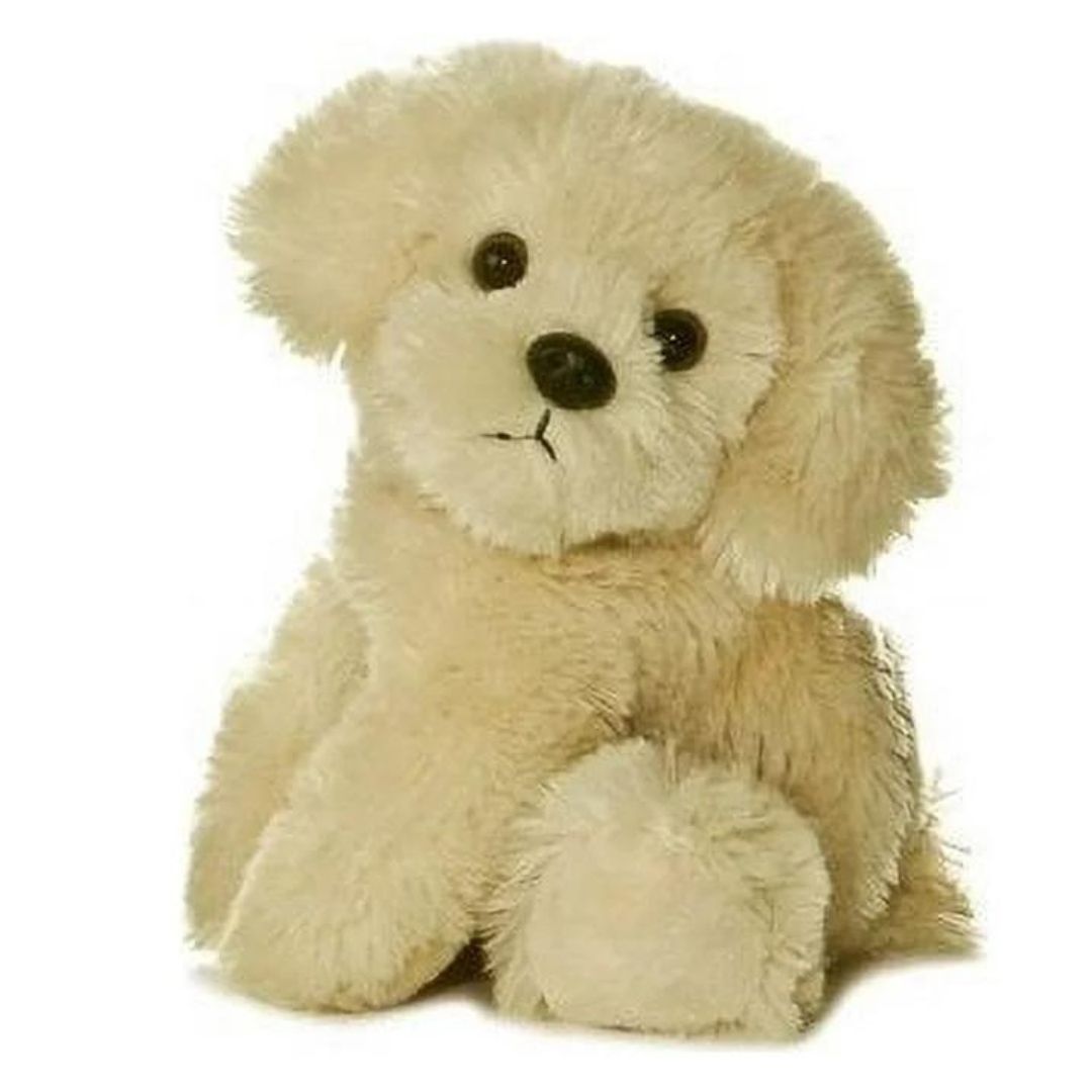 Front view of the fluffy cream-colored puppy plush resting with its head slightly tilted, showing its floppy ears and black nose.