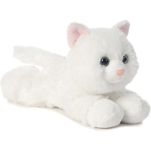 Angled side view of the Aurora Mini Flopsie Sugar Too White Cat 8-inch plush resting on its belly, featuring solid snowy-white fur and pink ears.