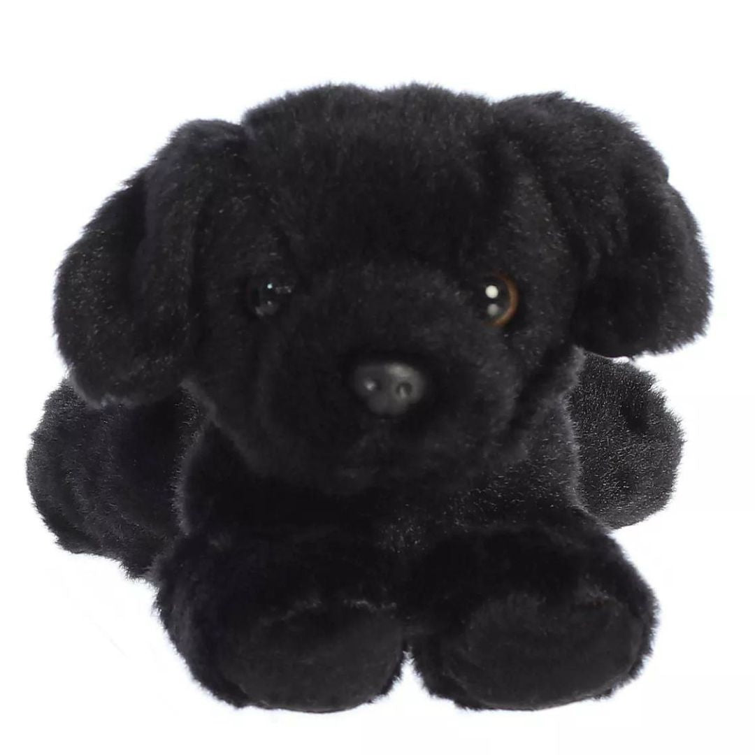 Straight-on front view of the soft black dog plush showing its face, floppy ears, and brown eyes.