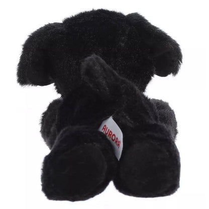 Direct back view of the cuddly Blackie dog plush highlighting its perky black tail and hind paws.