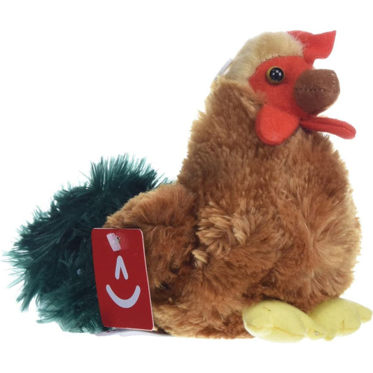 Angled front view of the 6-inch Aurora Mini Flopsie Cocky the Rooster stuffed animal sitting, showing its brown body, red comb, and dark green tail feathers.
