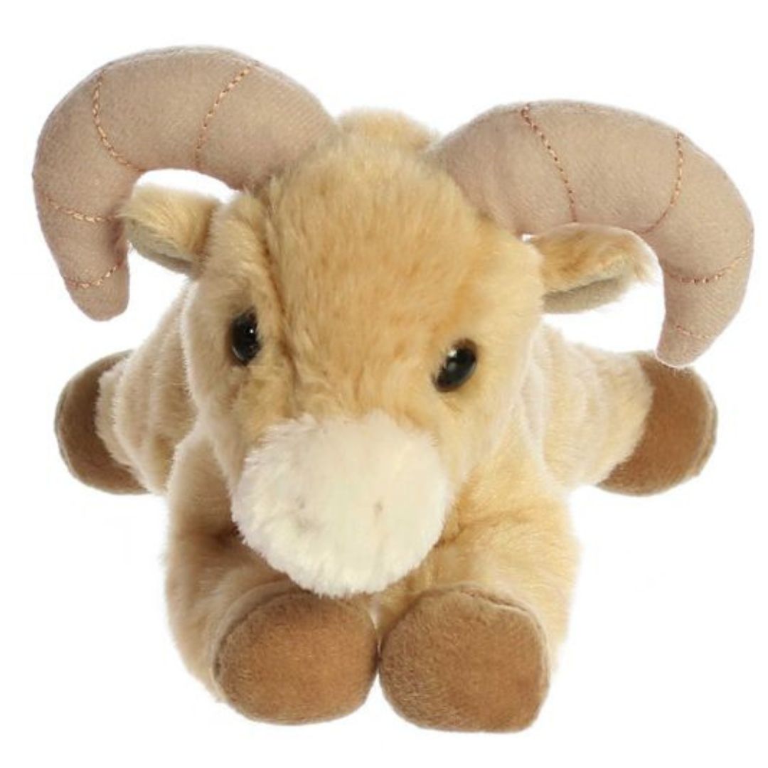 Straight-on front view of the bighorn sheep ram stuffed animal highlighting its white muzzle, dark eyes, and symmetrical curved horns.