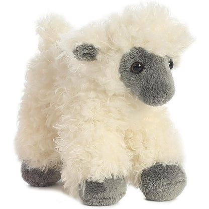 Angled front view of the 8-inch Aurora Mini Flopsie Black Face Sheep plush standing on its four dark hooves.