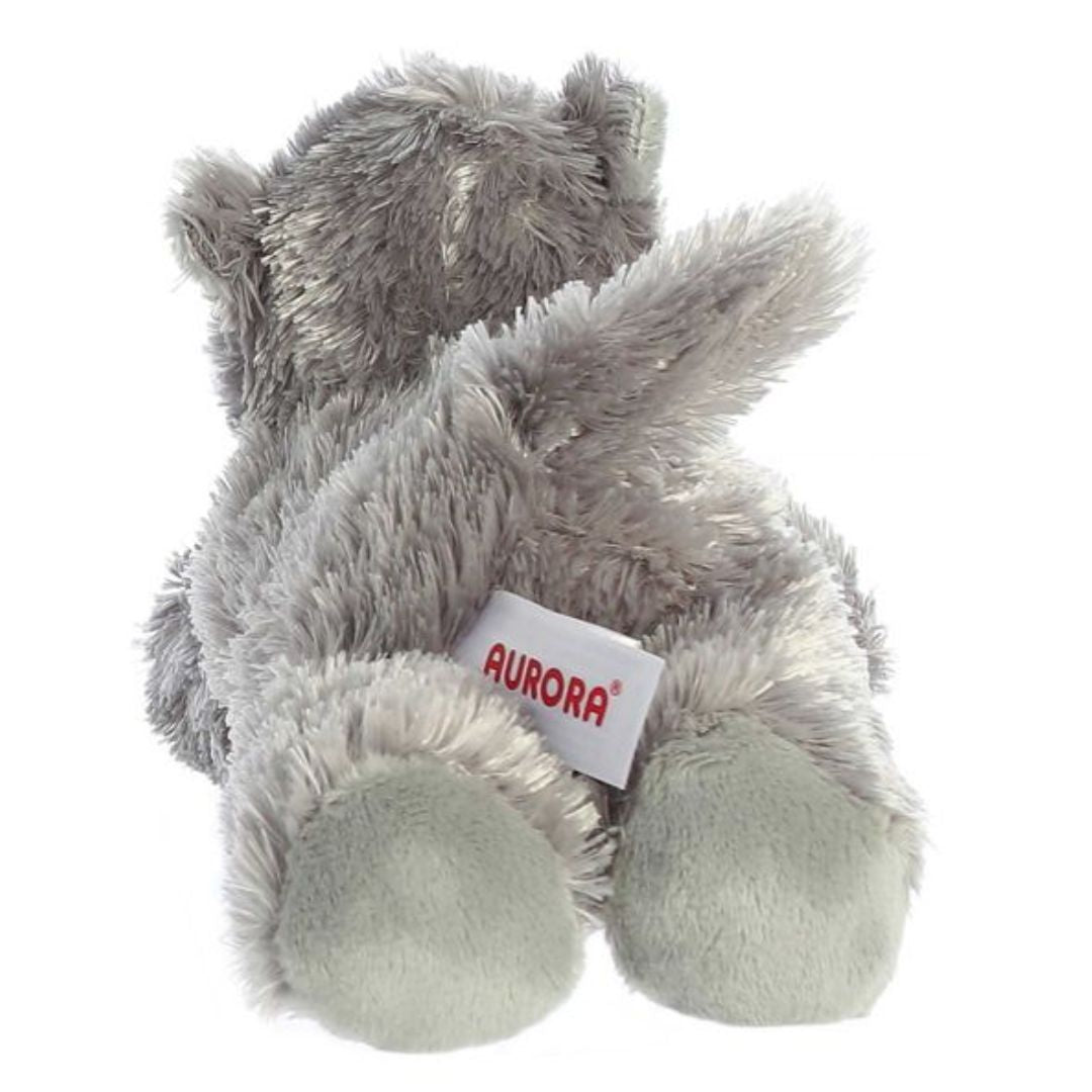 Direct back view of the cuddly hippopotamus stuffed animal highlighting its short tail and light grey back footpads.