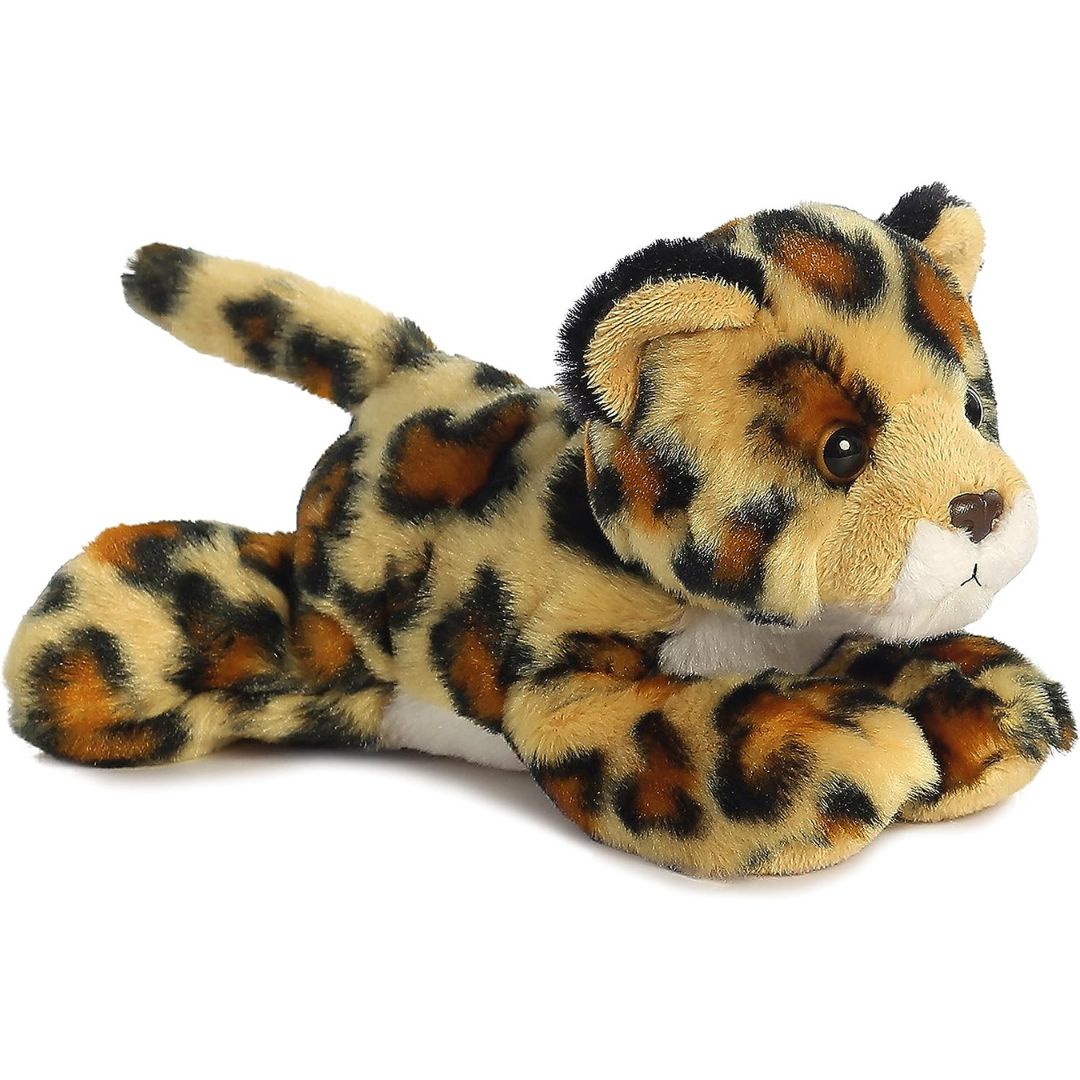 Angled front view of the 8-inch Aurora Mini Flopsie Amazon Jaguar stuffed animal lying down, showing its spotted golden coat.