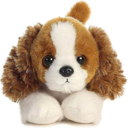 Straight-on front view of the soft Cavalier spaniel plush showing its sweet face, dark eyes, black nose, and white chest.