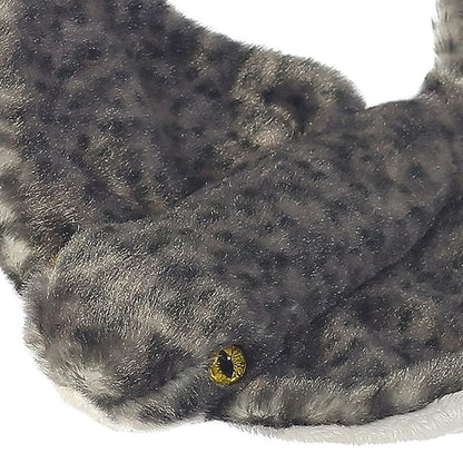 Close-up front angle of the stingray stuffed animal highlighting its textured grey back, subtle head shape, and striking golden eye.