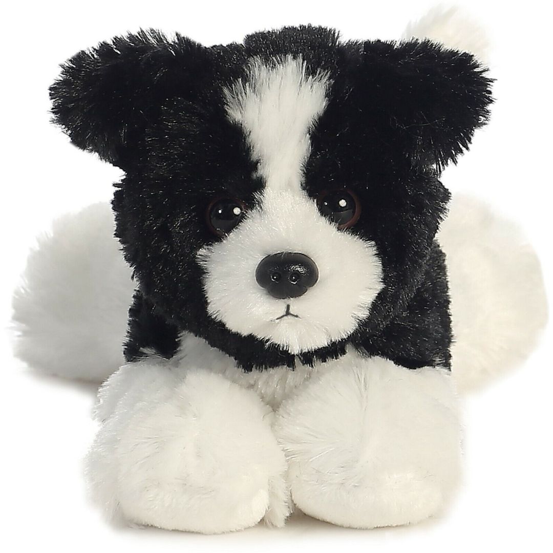 Straight-on front view of the Border Collie stuffed animal highlighting its white facial blaze, black nose, and folded puppy ears.