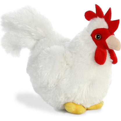 Angled front view of the 8-inch Aurora Mini Flopsie Chicken stuffed animal resting on its tummy, showing its fluffy white body and red comb.