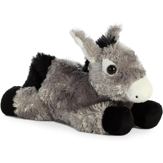 Angled front view of the 8-inch Aurora Mini Flopsie Donkey stuffed animal resting on its tummy, showing its grey coat, large ears, and black hooves.