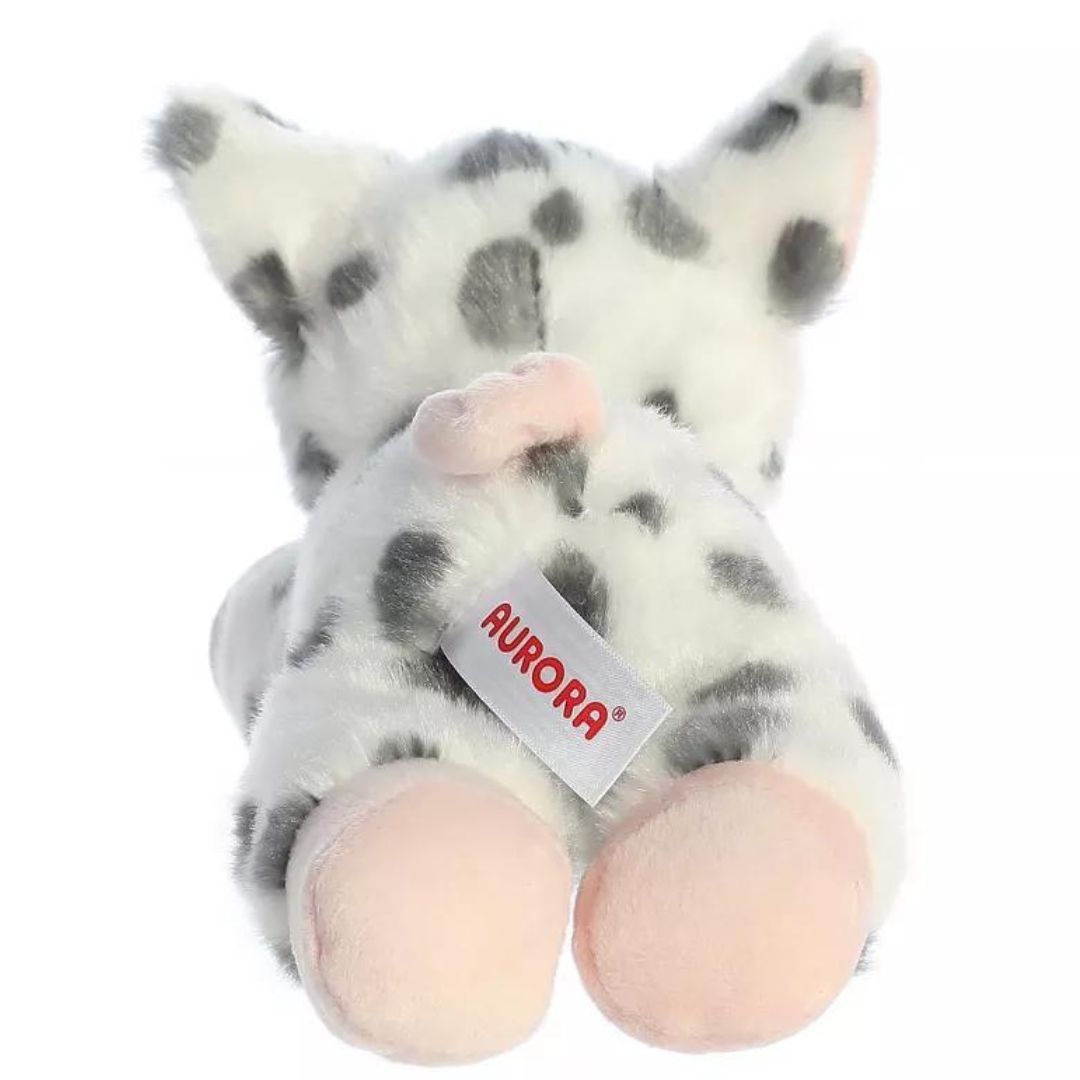 Back view of the Mini Flopsie Spotted Pig plush toy highlighting its grey spots, pink hind hooves, and cute curly pink tail.