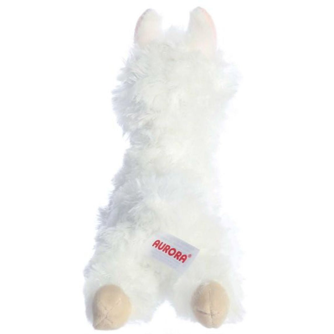 Rear view of the Ansy Alpaca plush showing its soft white back, rear tan hooves, and small fluffy tail.