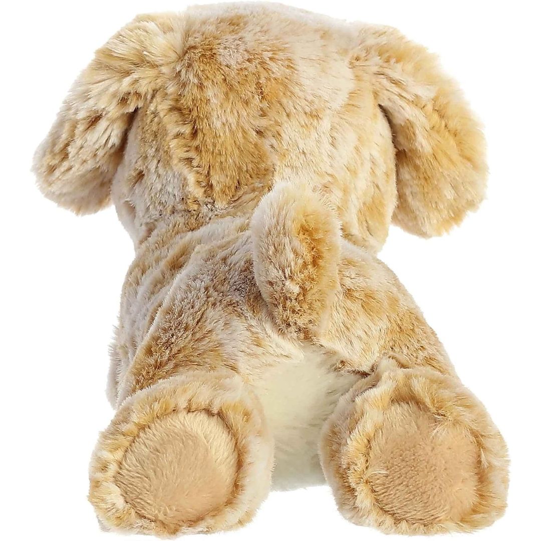 Rear view of the dog plush from behind, showing its golden back, extended hind legs with smooth paws, and small upright tail.