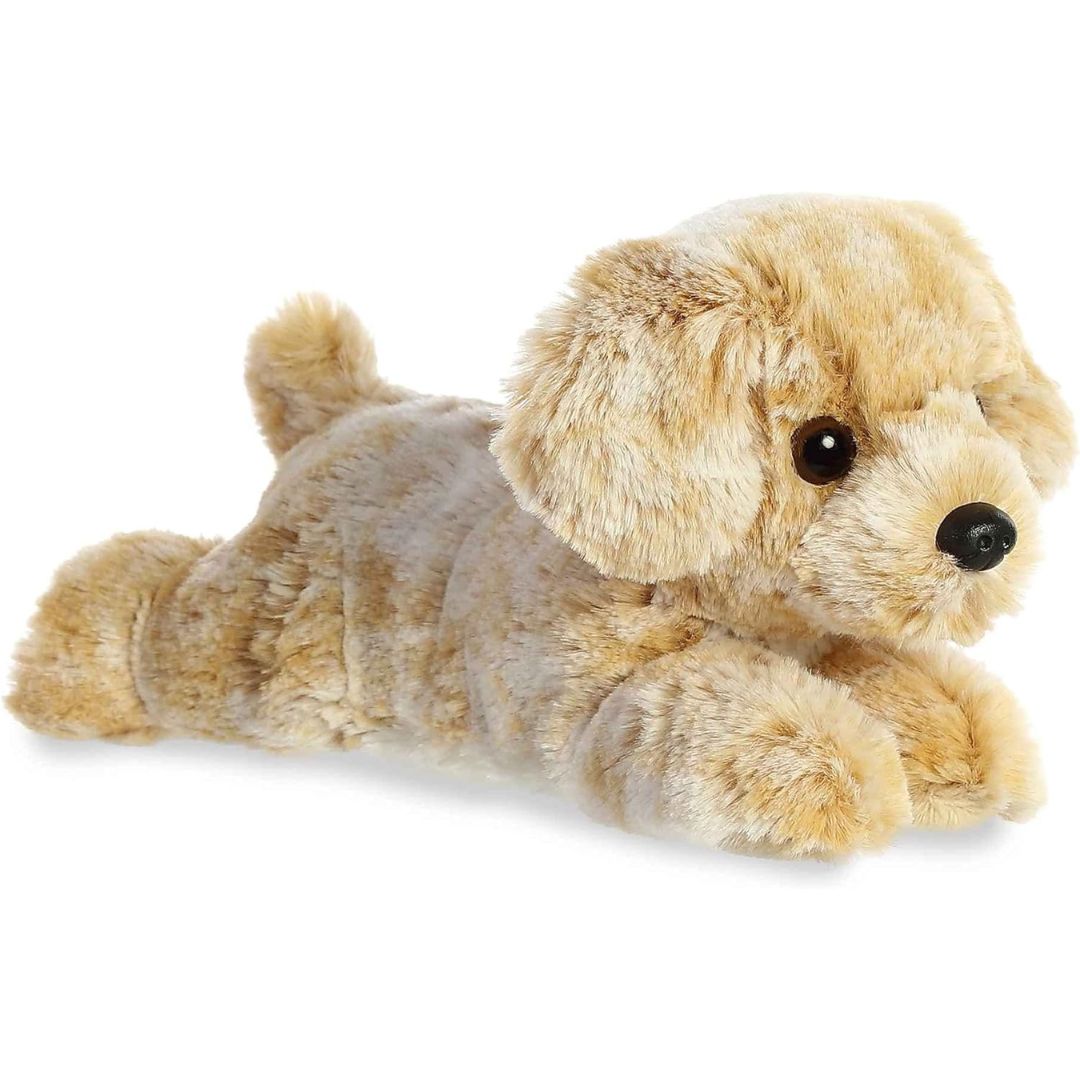 Angled side view of the Aurora Mini Flopsie Rusty Retriever 8-inch plush resting on its belly, featuring soft golden-tan fur.