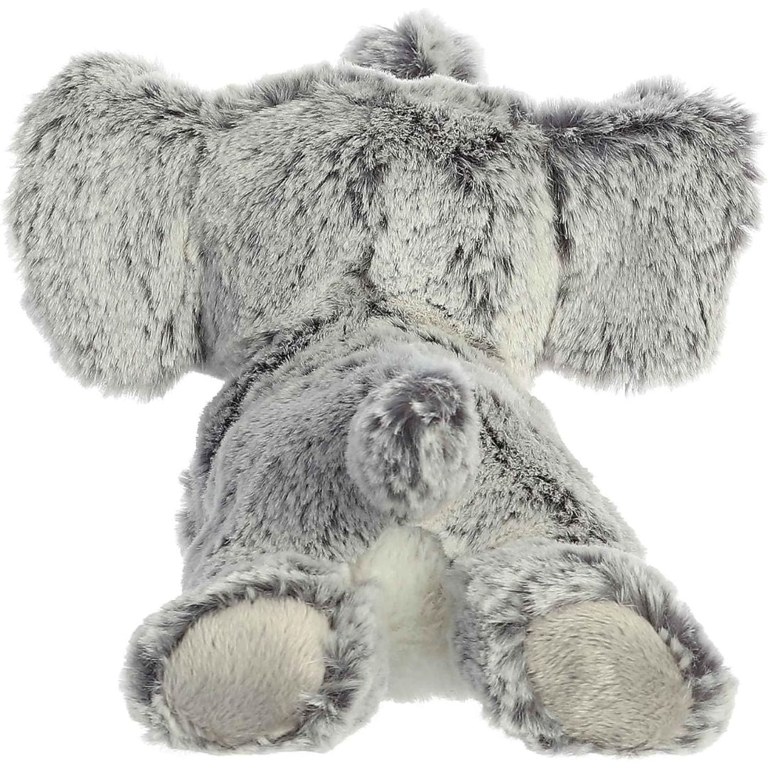 Rear view of the elephant plush showing its fuzzy grey back, large ears from behind, smooth footpads, and small tail.
