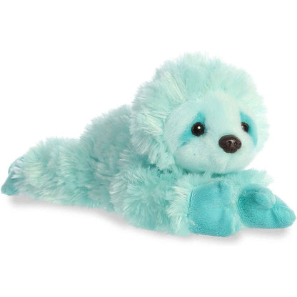 Angled side view of the Aurora Mini Flopsie Minty Sloth 8-inch plush resting on its belly, featuring fluffy mint-green fur and teal paws.