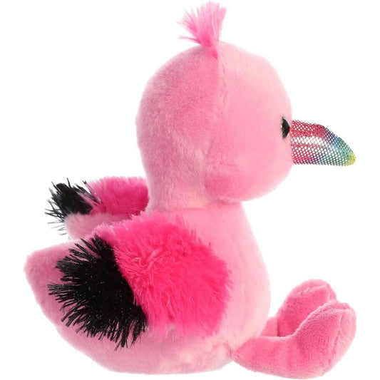 Side profile of the flamingo chick stuffed animal showing its fluffy pink wings with black tips and its curved sparkle beak.