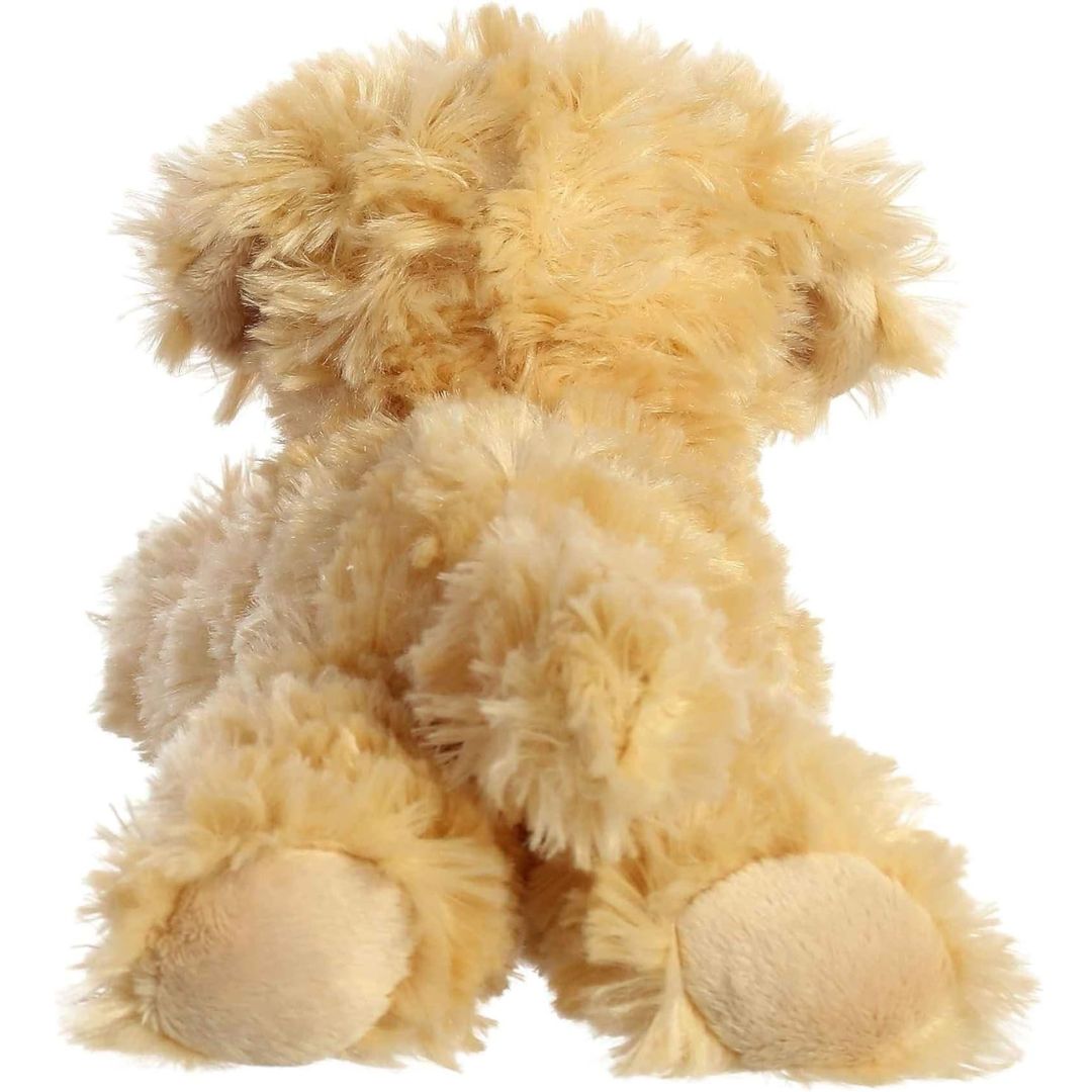 Direct back view of the cuddly Goldendoodle stuffed animal highlighting its fluffy tail and back paws.