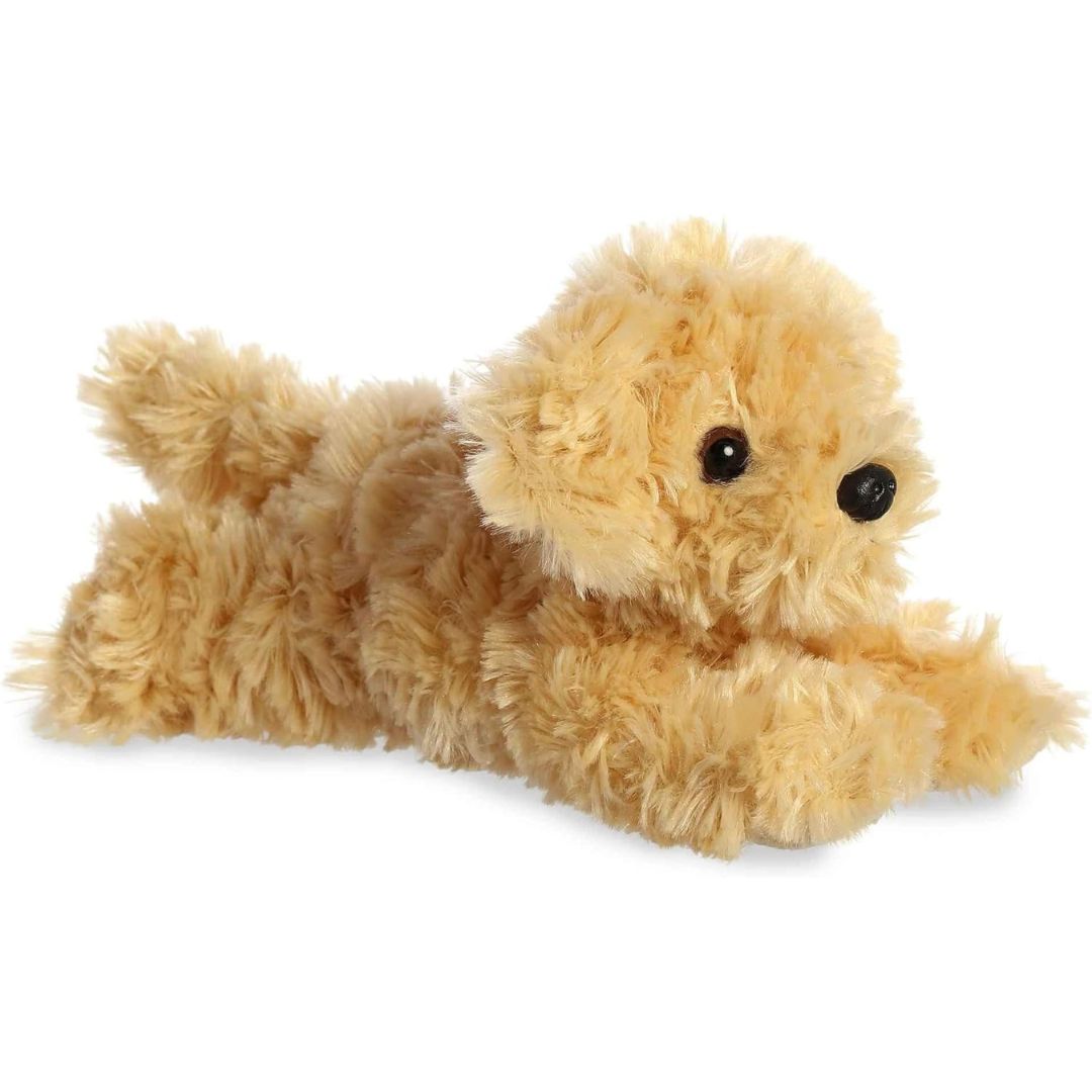 Angled front view of the 8-inch Aurora Mini Flopsie Ginny Goldendoodle stuffed animal lying down, showing its fluffy golden coat.
