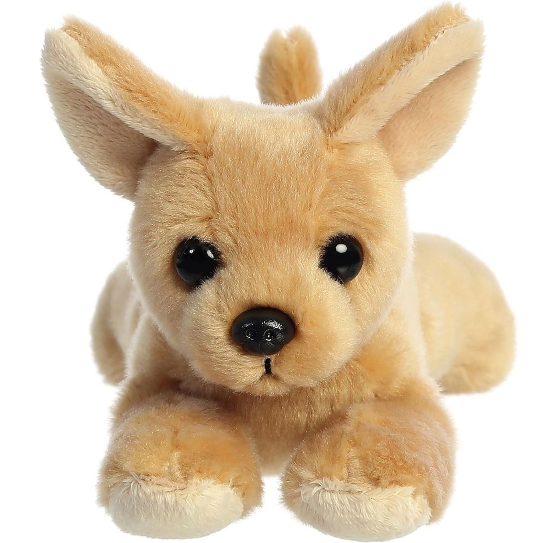 Straight-on front view of the tan chihuahua stuffed animal highlighting its large erect ears, dark eyes, and black button nose.