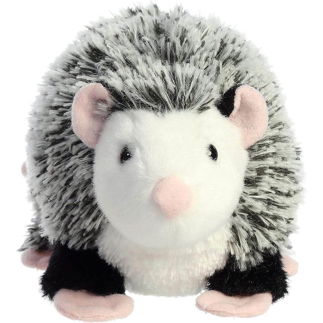 Straight-on front view of the soft Aurora plush opossum showing its white face and pink nose.