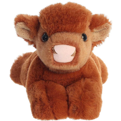 Straight-on front view of the Highland cow stuffed animal highlighting its cute pink snout and a fluffy tuft of hair on its forehead.