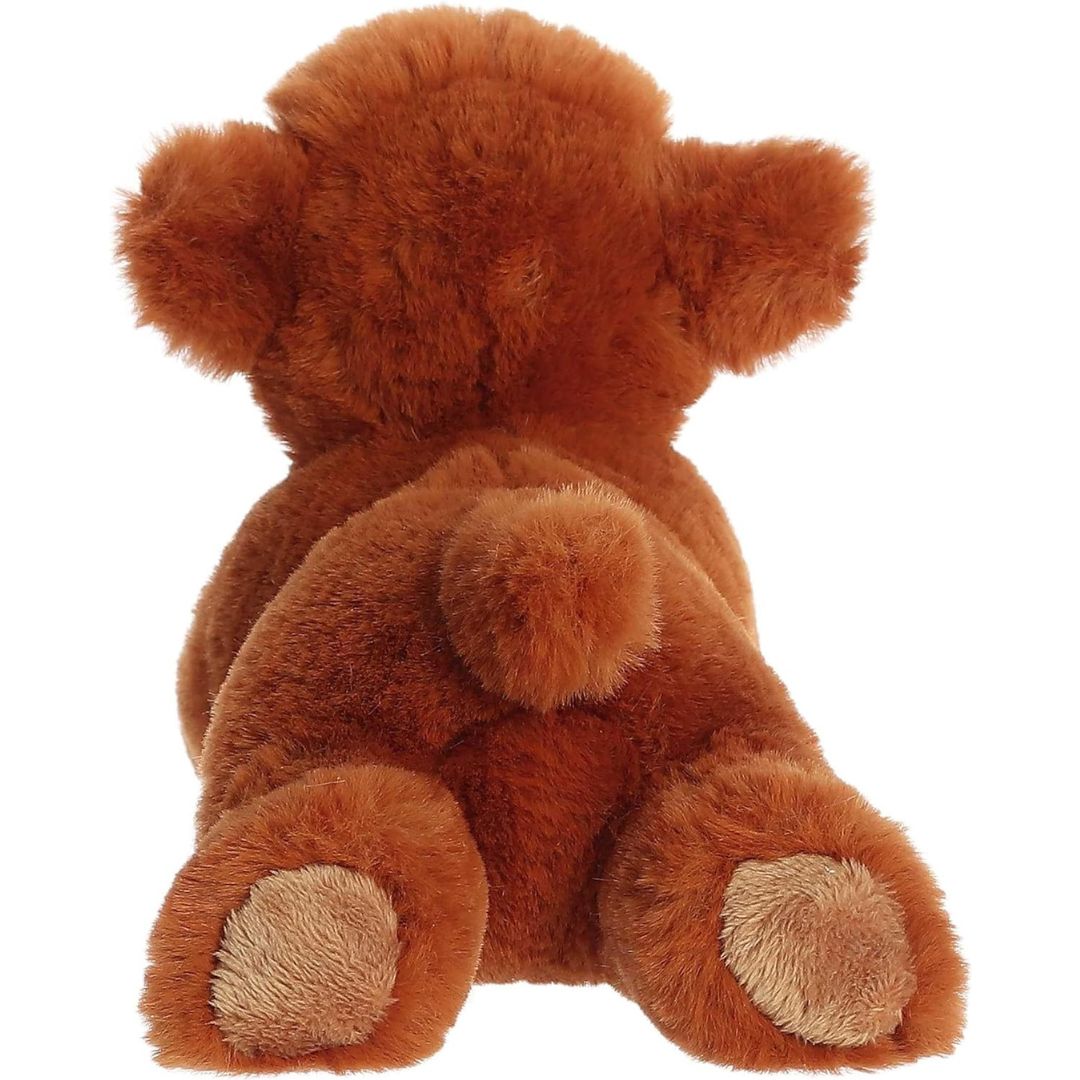 Rear view of the Highland calf plush showing its soft back, light tan hooves, and small fluffy tail.