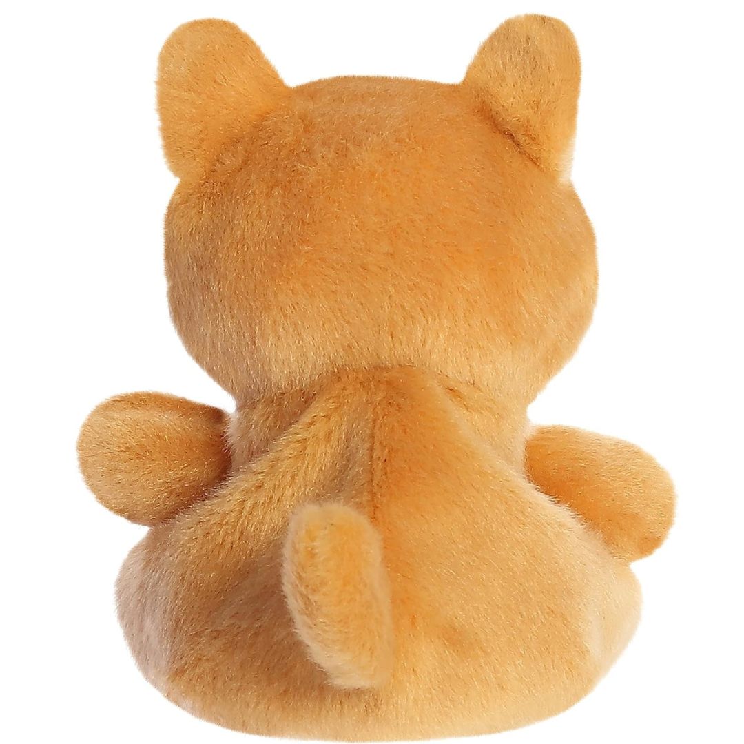 Rear view thumbnail of the Aurora Shiba Inu stuffed toy displaying its smooth golden-tan backing and curled-up plush tail.