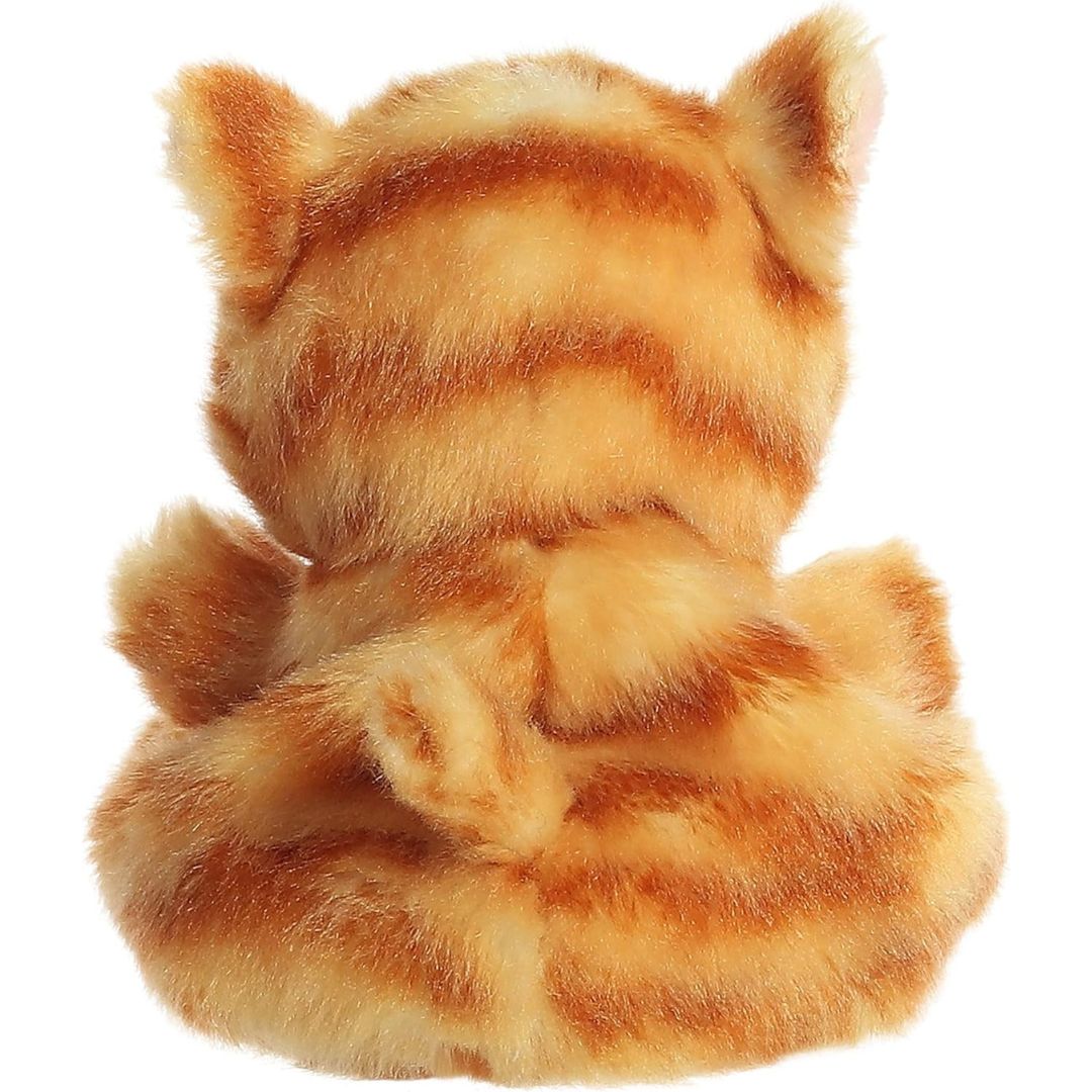 Back view of the Aurora Palm Pals cat plush toy showing its orange and brown striped back and a fluffy little tail.