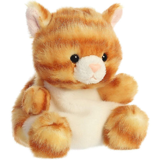 Angled view of the Aurora Palm Pals 5-inch Meow Orange Kitty plush sitting upright, showing its orange striped fur and white belly.