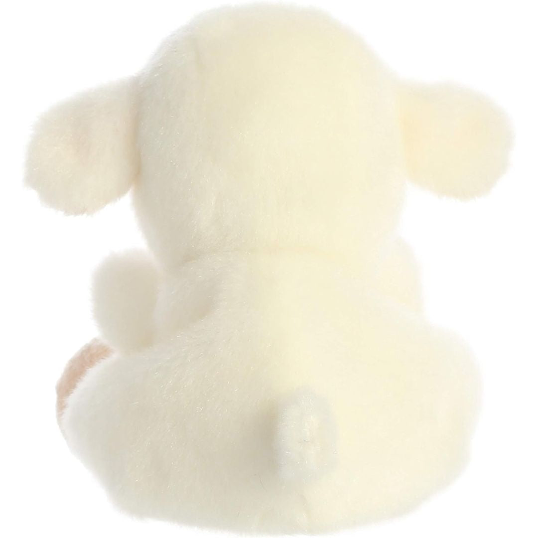Rear view thumbnail of the Aurora lamb stuffed toy displaying its smooth cream-colored back and tiny stubby tail.