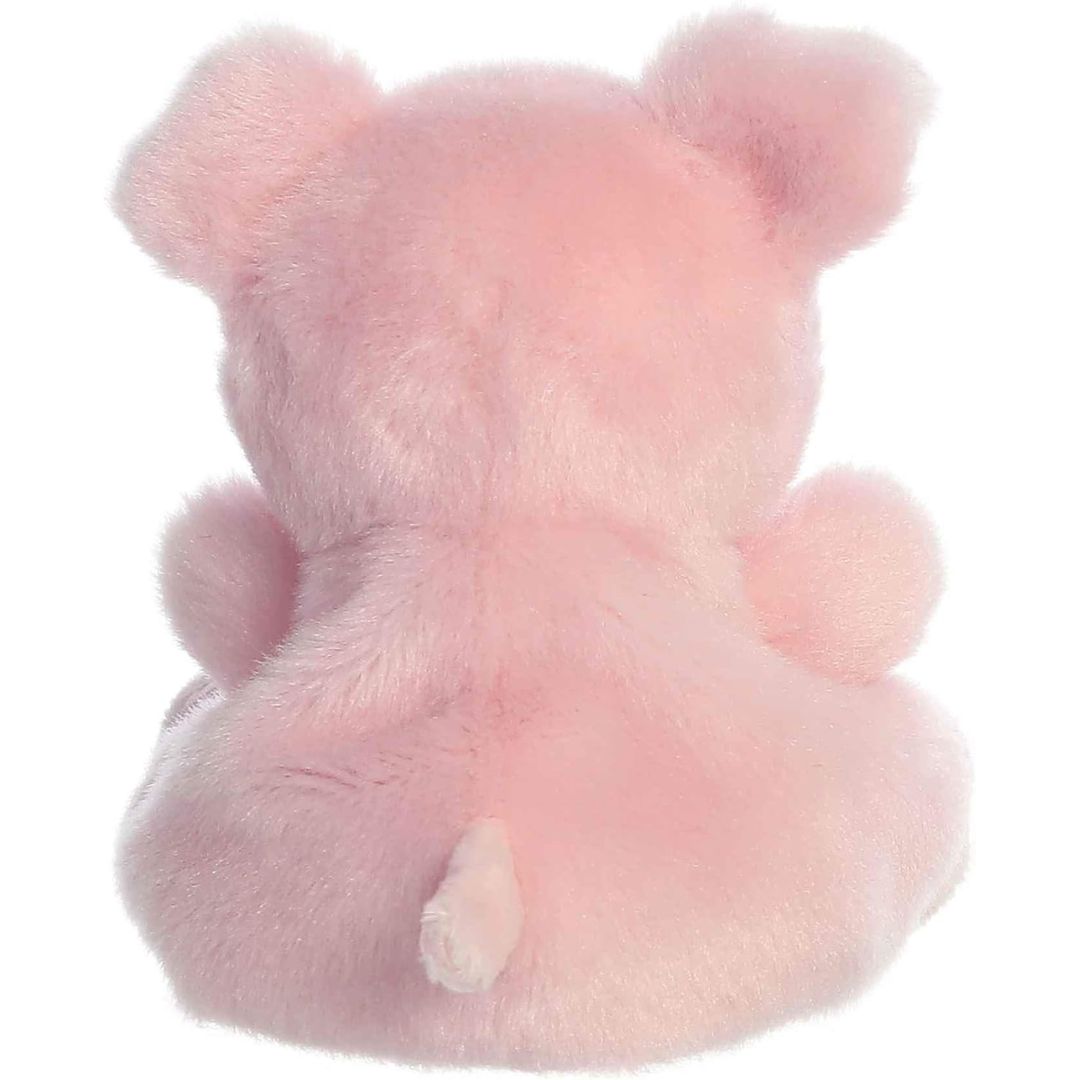 Rear view thumbnail of the Aurora pig stuffed toy displaying its smooth, solid pink plush backing and small plush tail.