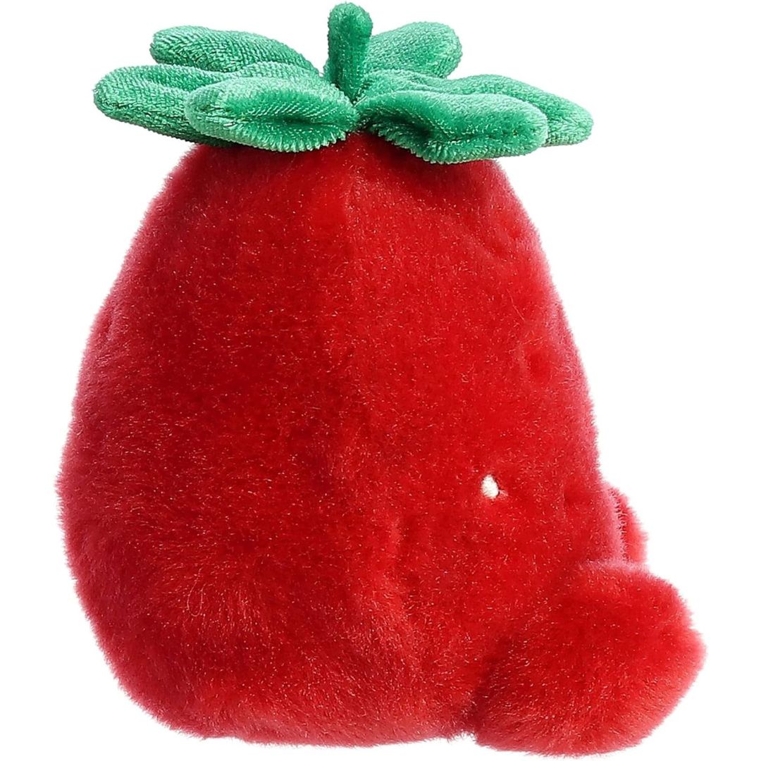 Side profile of the Aurora Palm Pals Juicy Strawberry plush highlighting its round shape and green stem.