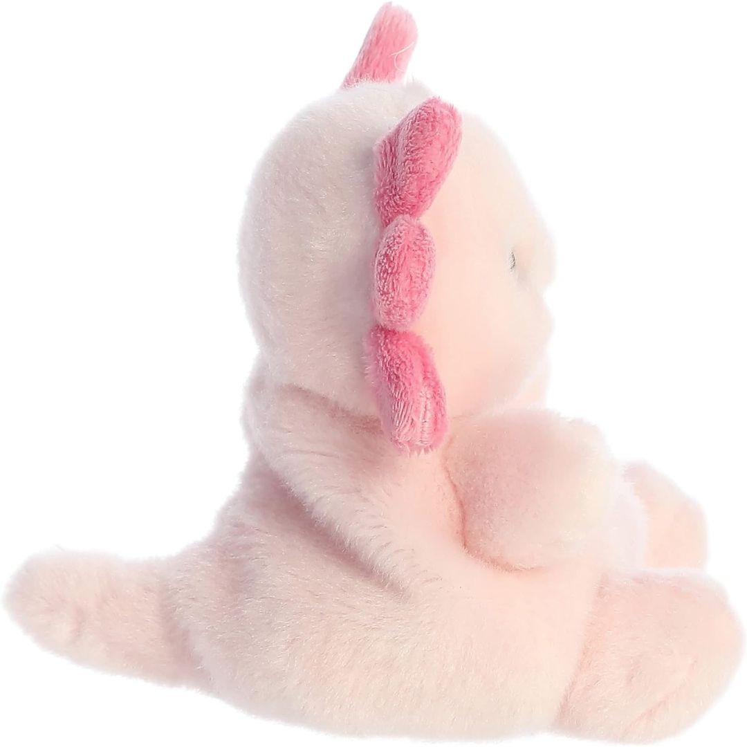 Side profile view thumbnail of the mini axolotl plush showcasing its rounded back profile, head gills, and a distinct plush tail extending behind.
