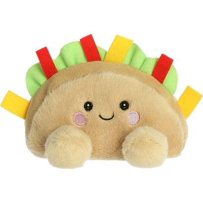 Front view thumbnail of the cute Fiesta Taco plush sitting straight, highlighting its dark safety eyes, rosy pink cheeks, and small tan plush feet.