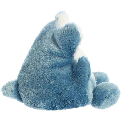 Side profile view of the Palm Pals Hammerhead Shark plush toy highlighting its bean-weighted sitting posture and little dorsal fin.