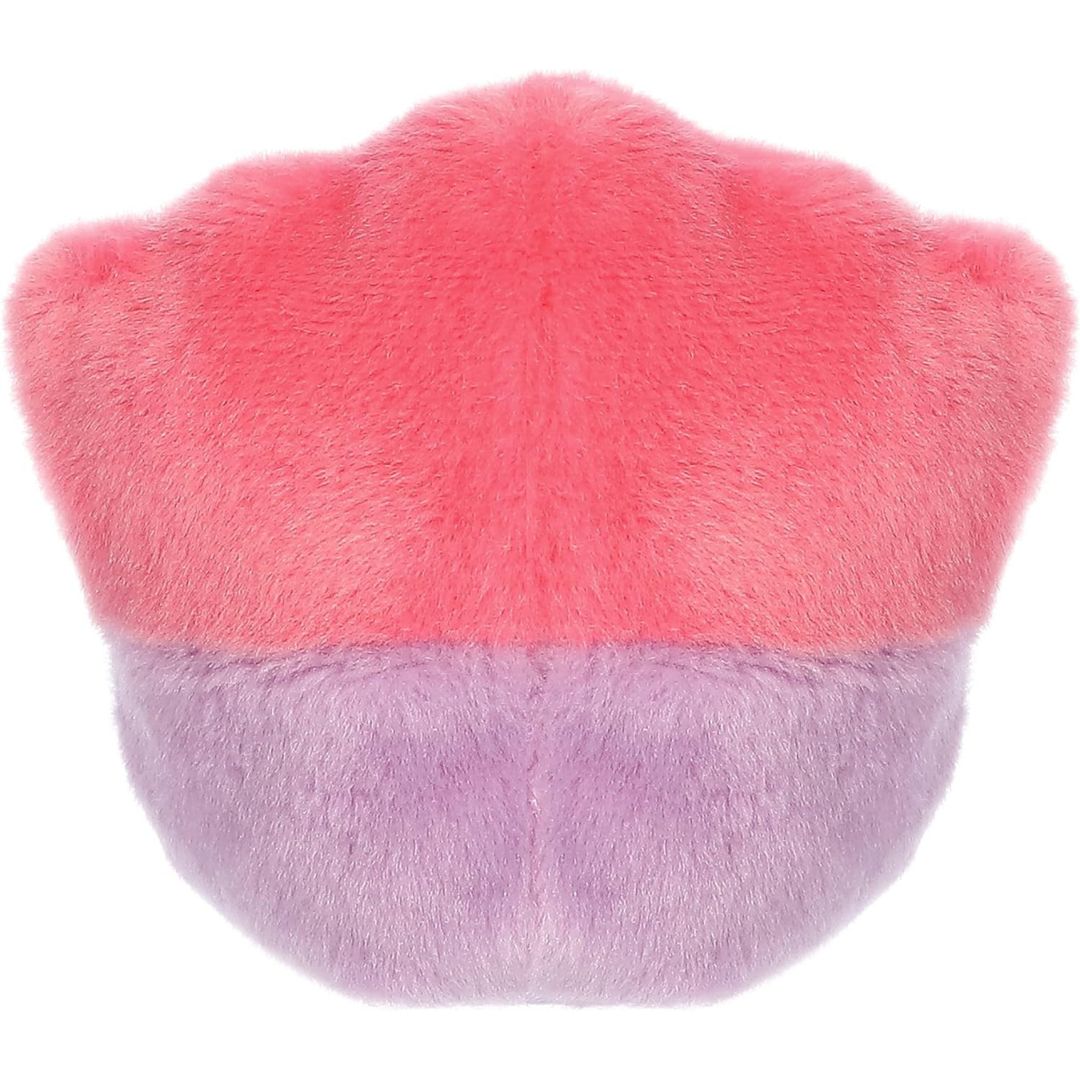 Rear view thumbnail of the Aurora cupcake stuffed toy displaying its clean hot-pink and lavender-purple plush backing.