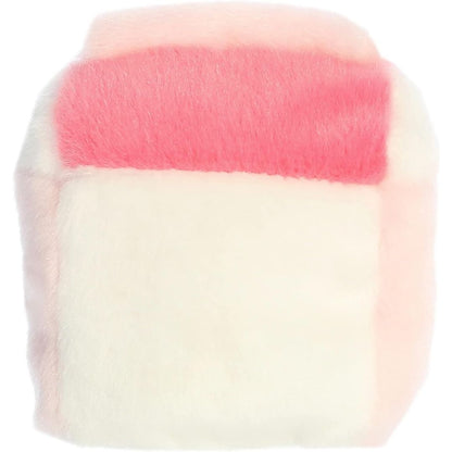 Rear view thumbnail of the Aurora strawberry milk stuffed toy displaying its smooth, solid cream and pink plush backing.