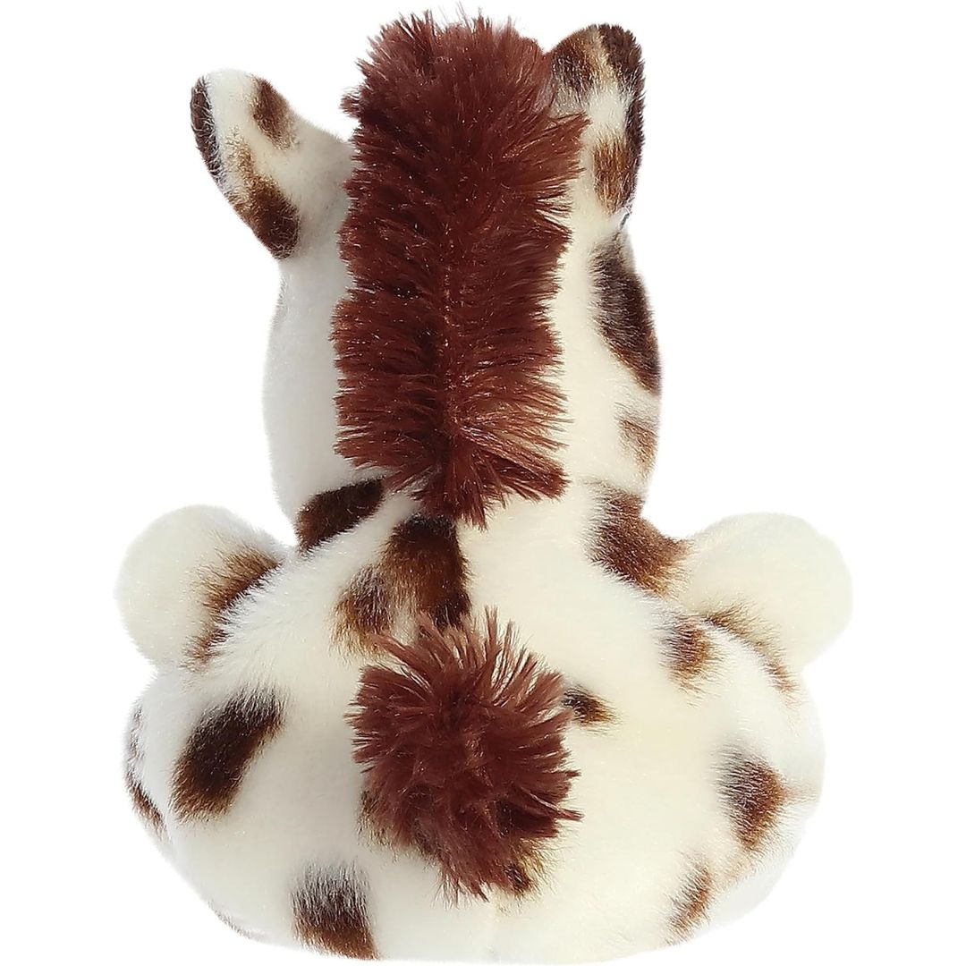 Back view of the Haymitch Painted Horse plush showing its fluffy brown tail and spotted back.
