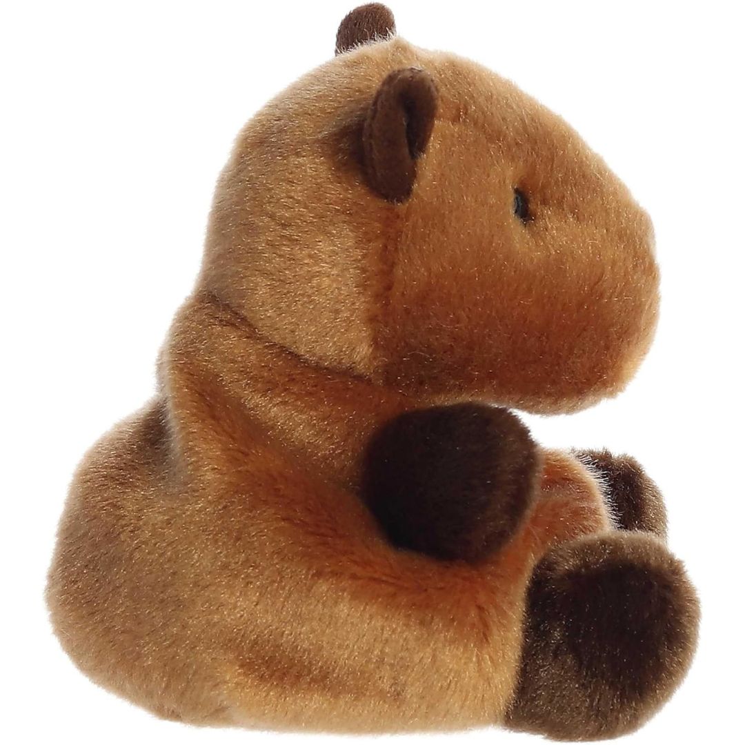 Side profile view thumbnail of the mini capybara plush showcasing its blocky head shape, sloped back, and soft seated posture.