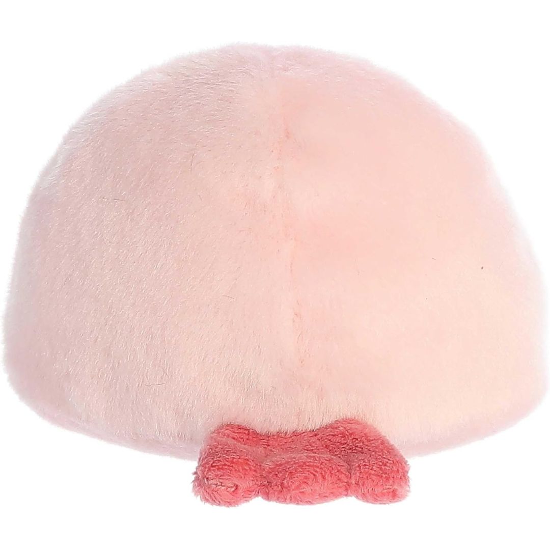 Rear view thumbnail of the Aurora blobfish stuffed toy displaying its smooth, solid pastel pink backing and a small dark pink tail fin at the base.