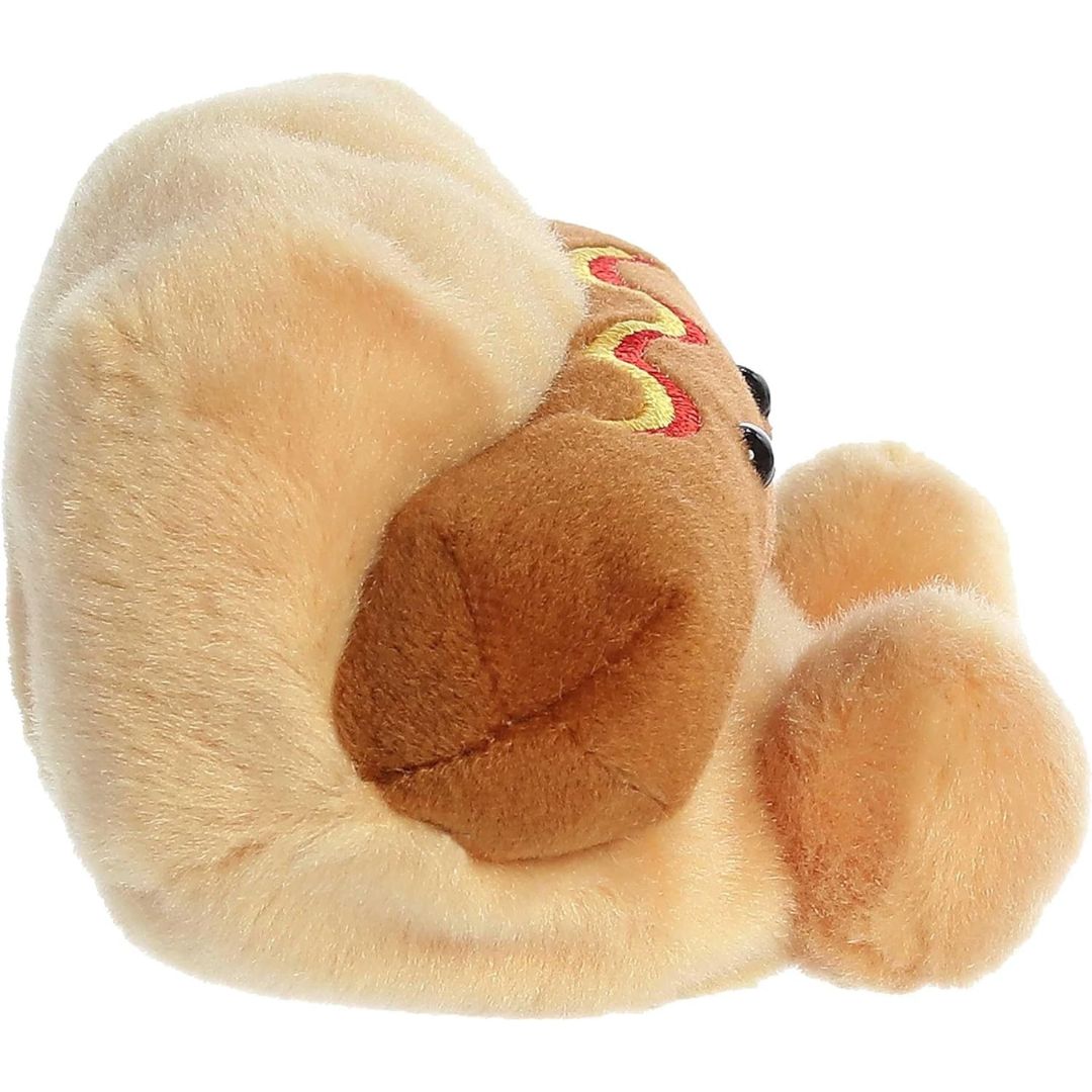 Side profile view thumbnail of the mini hot dog plush showcasing its thick bun shape, brown frankfurter, and soft seated profile.