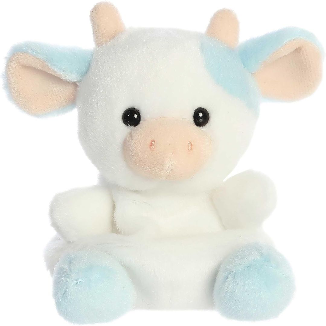 Front view thumbnail of the cute Skyla Blueberry Cow plush sitting straight, highlighting its dark safety eyes, outspread ears, and small pastel blue paws.