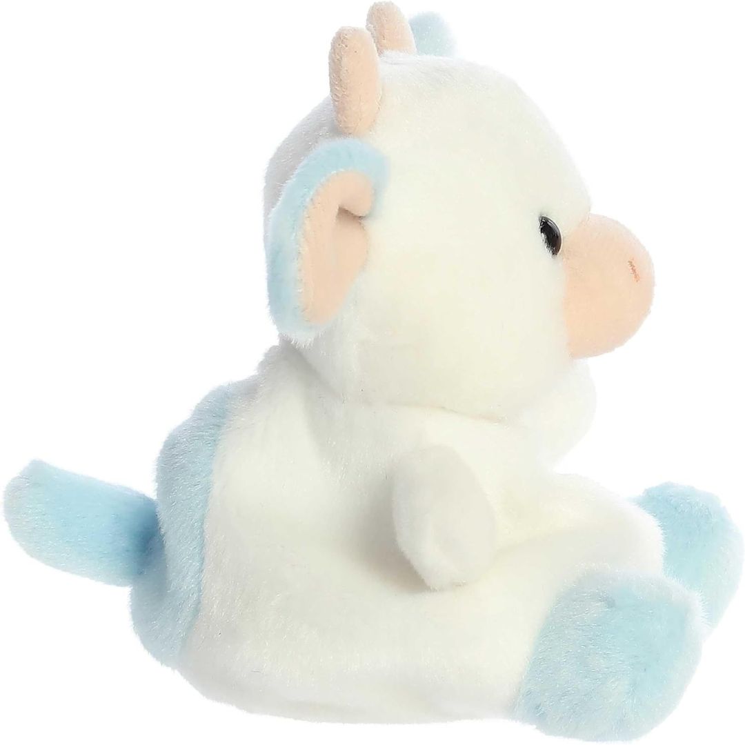 Side profile view thumbnail of the mini cow plush showcasing its soft rounded body, cream snout profile, and pastel blue tail.