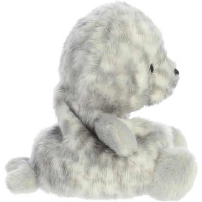 Side profile view of the Palm Pals Harbor Seal plush highlighting its round, perfectly squishy body and back flippers.