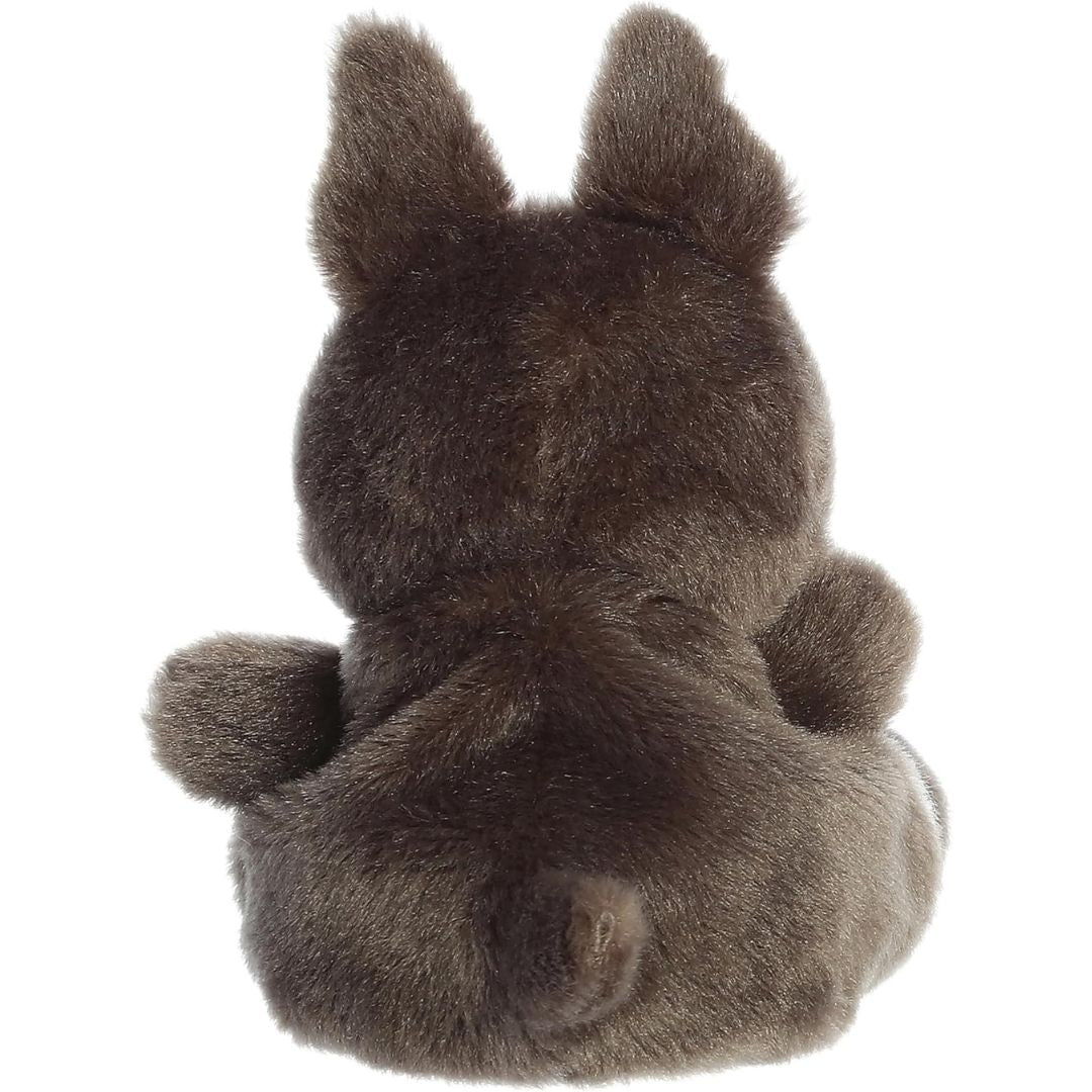 Direct back view of the cuddly brown Palm Pals puppy stuffed animal showing its tiny little tail.