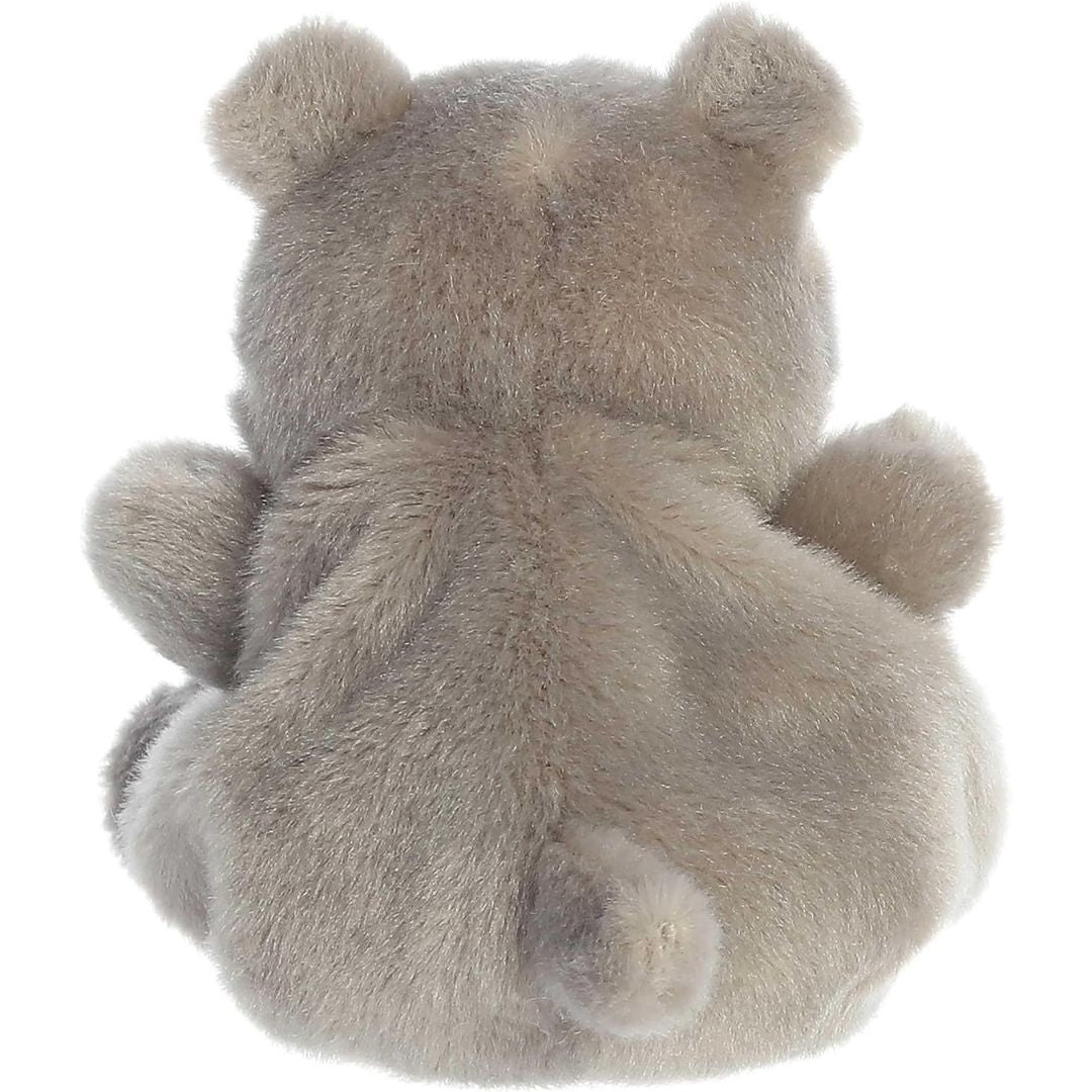 Back view of the Aurora Palm Pals hippo plush toy showing its solid taupe-grey back and a cute little tail.